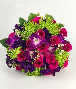 bright bouquet-pink roses-orchids-mums-stock